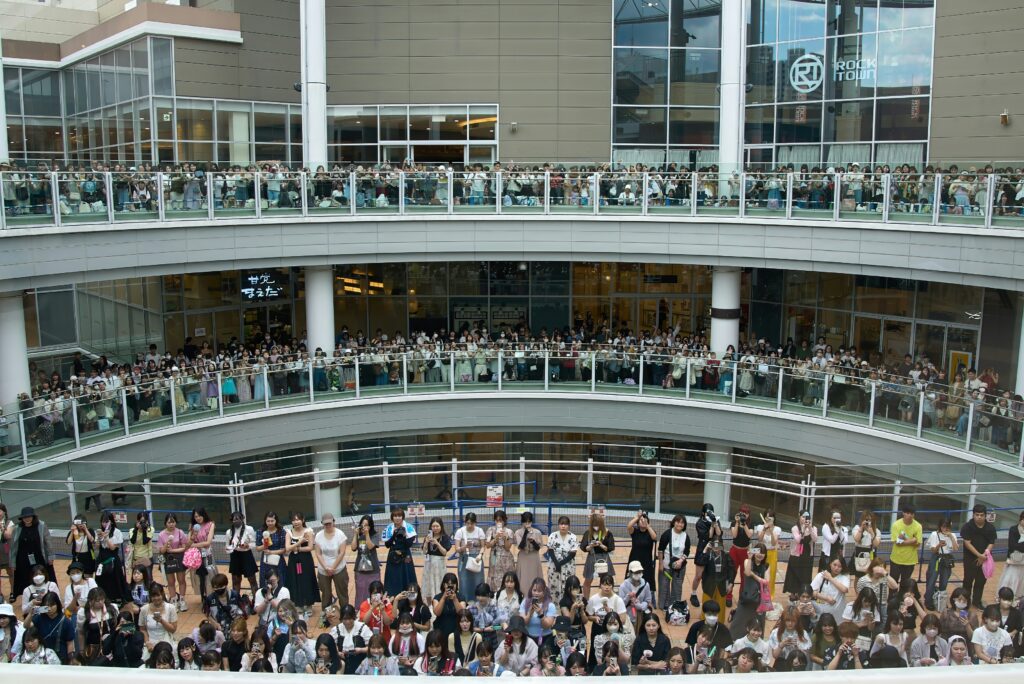 Composition showing a street corner or cafe with a smartphone