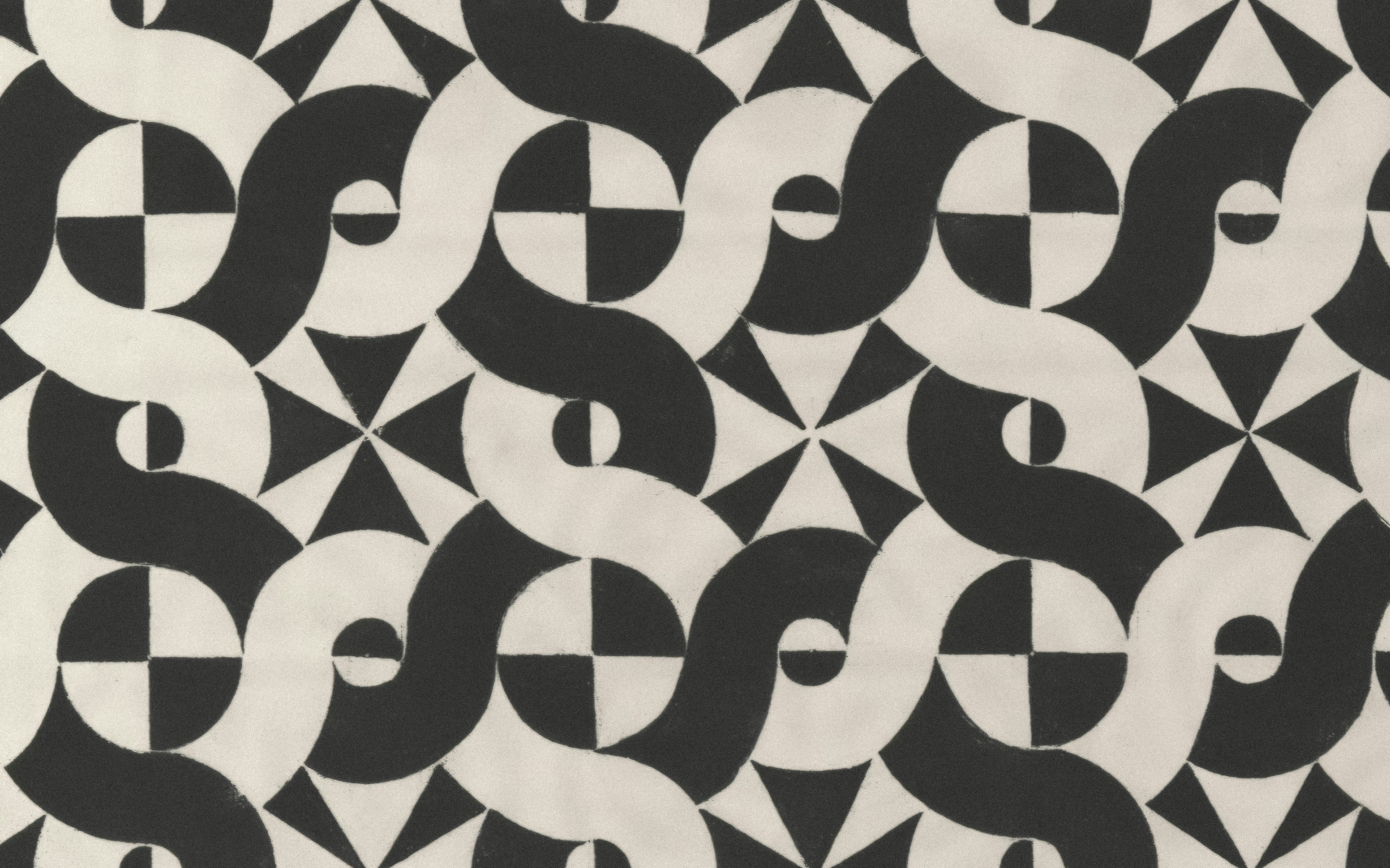 デザインソフトを開いたノートPCと、横に置かれたドル札のイメージ